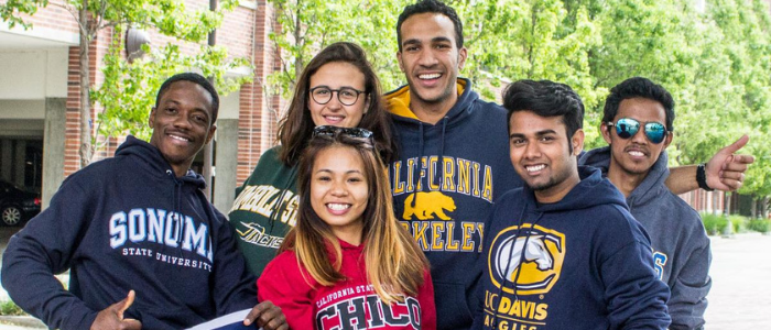a group of students wearing university sweaters