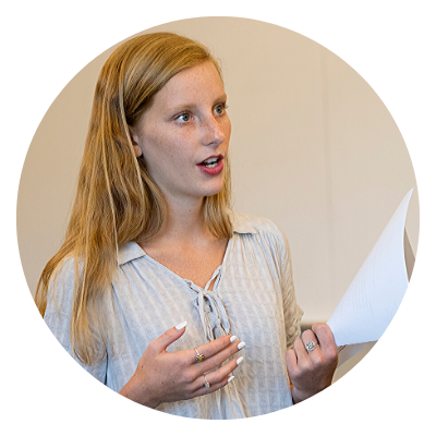 student holding a paper
